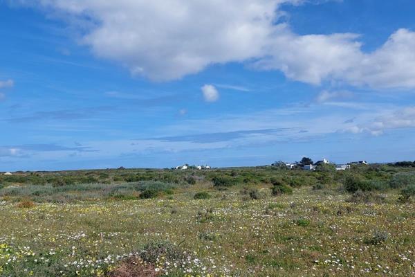 Nestled within the serene coastal enclave of Jacobsbaai, this vacant smallholding ...