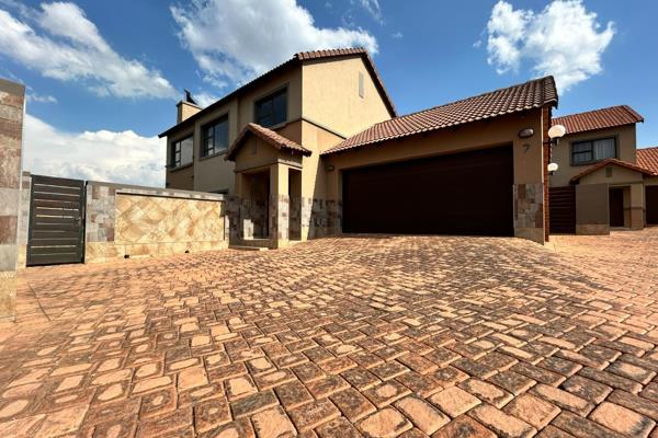 Situated within the picturesque enclave of Thatchfield in Centurion, this enchanting ...