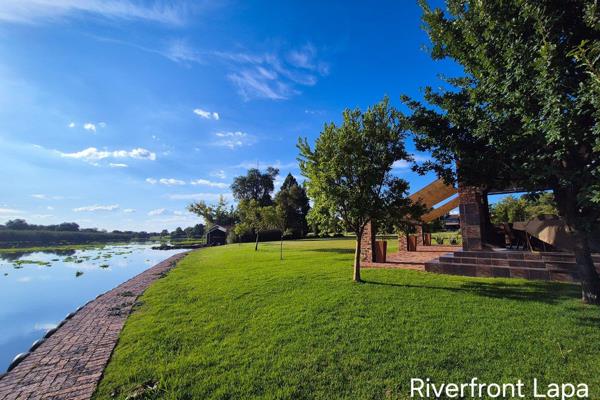 This stunning and secure property offers the following features:

•	River access is conveniently located just off the ...