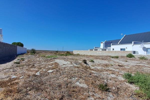 An expansive stretch of vacant land awaits, presenting a rare chance to construct your ...