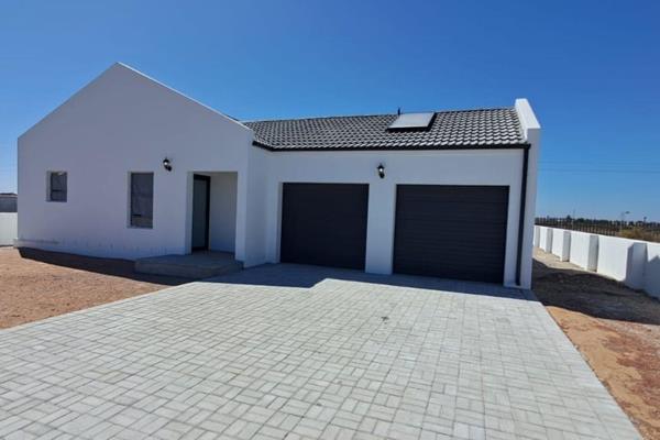 Welcome to Atlantic Sands South, a charming newly constructed home boasting three ...