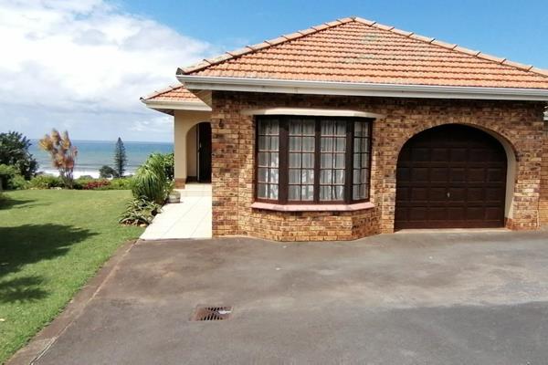 This spacious and neat townhouse is in the popular suburb of Umtentweni (Port ...