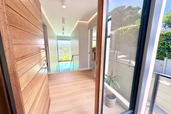 Set in a small, quiet cul-de-sac within the very best part of Beacon Bay, there is nothing about this modern and exquisite home that ...