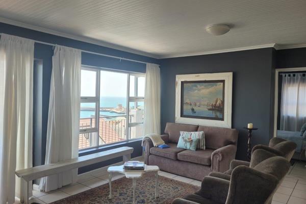 This neat as a pin open plan 2 bedroom, 1 bathroom apartment in a popular apartment block in the heart of Mossel Bay Central is a rare ...