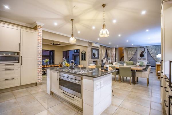 Set within the prestigious Mooikloof Gardens Estate, this exquisite property epitomises refined living and offers a secure lifestyle in ...