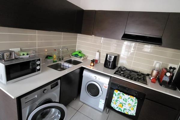 Lovely 1 bedroom 1 bathroom, open plan kitchen and living area, leading onto a small ...