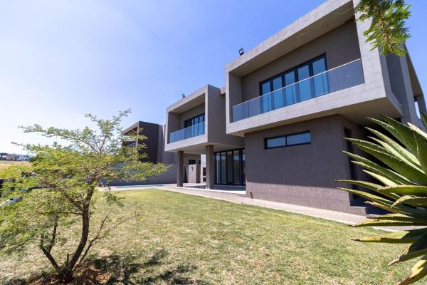 This property offers nothing but peace and tranquility in the Eye of Africa Golf Estate!!

This contemporary family home comes ...