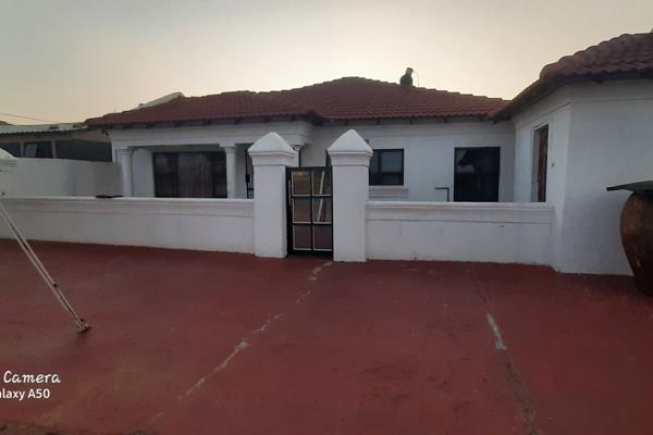 Three bedroom house is offering the following:

3 Bedroom, main bedroom with a corner ...