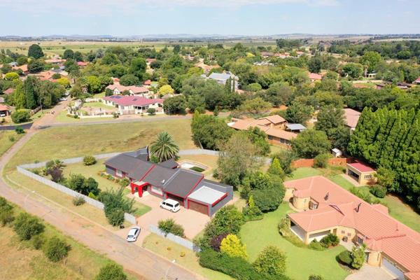 Nestled in a serene neighborhood, this captivating family home presents a perfect blend ...