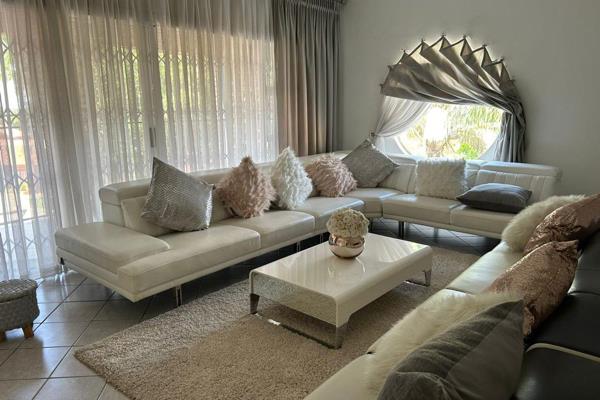 Nestled within the serene suburb of Cashan, Rustenburg, this exquisite family home offers an unparalleled blend of modern comfort and ...