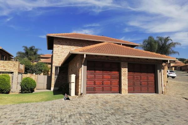 Captivating cluster home for sale in secure estate.The home features an open plan ...