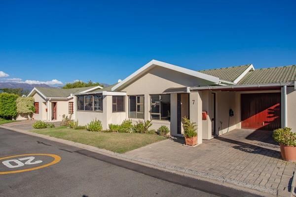 SOLE MANDATE - Step into a light-filled, open-plan living area, seamlessly integrating the kitchen and dining area for effortless ...