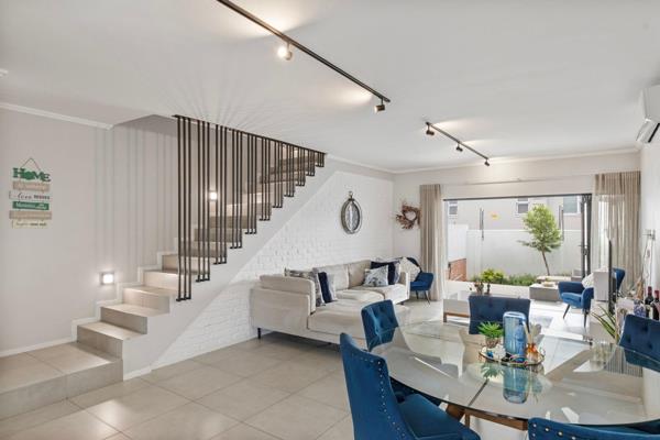 Discover contemporary living at its finest in this stunning duplex townhouse nestled within a secure complex, tucked away in an ...