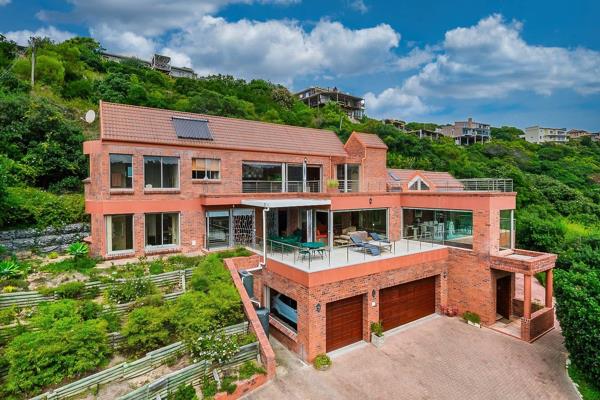 Designed by an award winning architect, this impressive low maintenance north facing home is built on a hillside to take advantage of ...