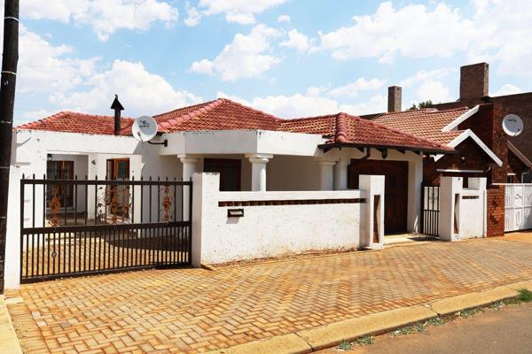 Welcome to this beautifully presented 3-bedroom home in Pimville, Soweto, where modern ...