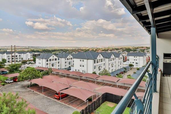 This exquisite top-floor residence within Greenstone Gate is a charming two-bedroom ...