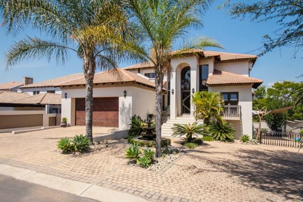 Indulge in the epitome of luxury living with this exquisite 5-bedroom sanctuary in Garsfontein. Four bedroom boasts its own en-suite ...