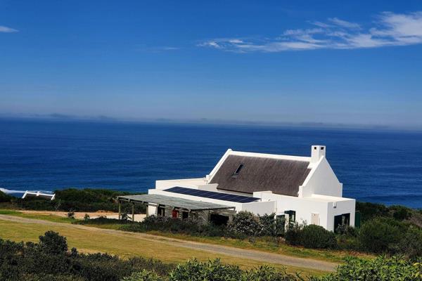 Perched gently atop a slight elevation, this stand/share boasts an ideal location for building your off-grid home, offering serene ...