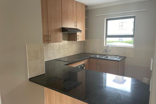 Modern 2-bedroom 2 bath apartment for sale  in sought-after Villa D&#39;Alegria in Halfway Gardens. 

Open-plan kitchen with ample ...