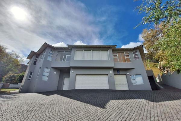 A five-bedroom villa in an astounding setting against the mountain with panoramic ocean ...