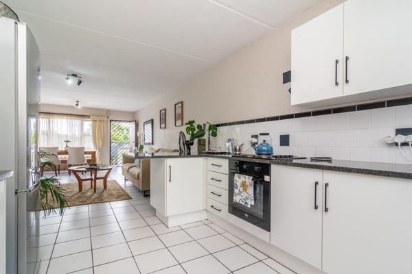 Open plan kitchen, lounge, dining leading onto balcony overlooking the Linden High ...