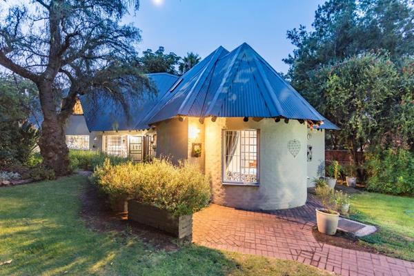 This home has an African beat to its soul, where birds sing, every window is a picture ...