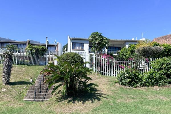 Located across the road from Port Alfred&#39;s Kiddies Beach, this apartment  offers ...