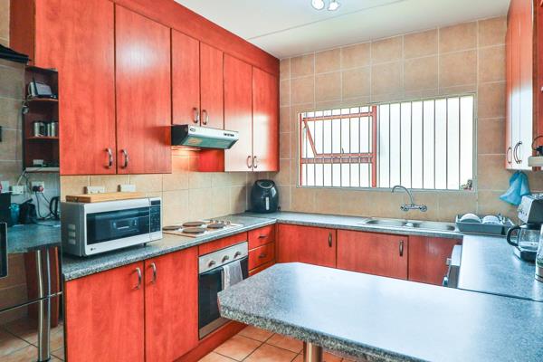 Upmarket second floor apartment for sale!

.  Kitchen with melamine counter tops,space ...