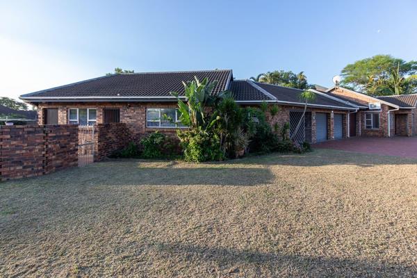 This face brick mansion has an incredible entertainment area. The home is set on a landscaped corner stand. The large covered patio ...