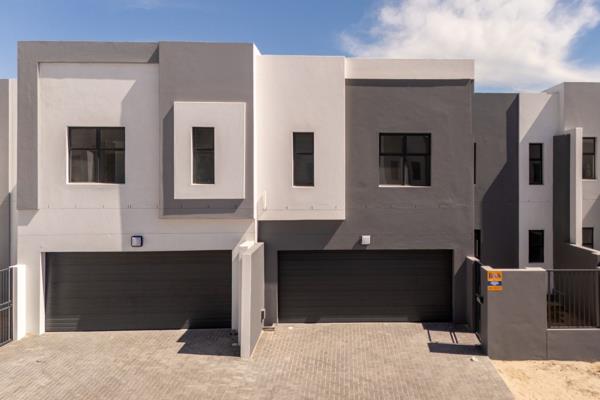 Nestled in the serene suburb of Sandown in Blouberg, this charming 3-bedroom house offers a perfect blend of comfort and security ...