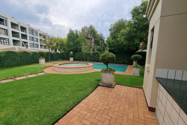 Enjoy this North facing unit with a view of Johannesburg from the balcony.

The spacious open plan lounge, dining room and kitchen ...