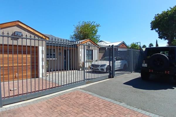 A modern 2-bedroom, 2-bathroom home in sought-after Rondebosch East is a desirable ...