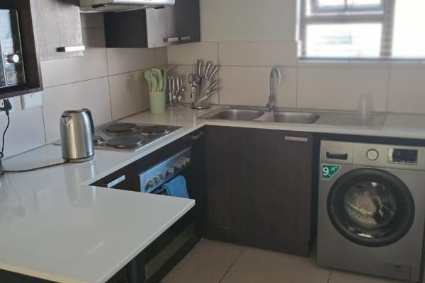 Beautiful and modern apartment ideal for a young professional, couple, or investment ...