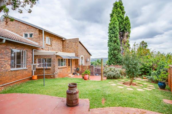 This contemporary family home, perched against the mountain and offering stunning views ...