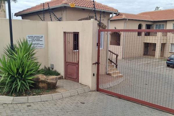 Neat first floor two bedroom townhouse | communal pool and braai area | great ...