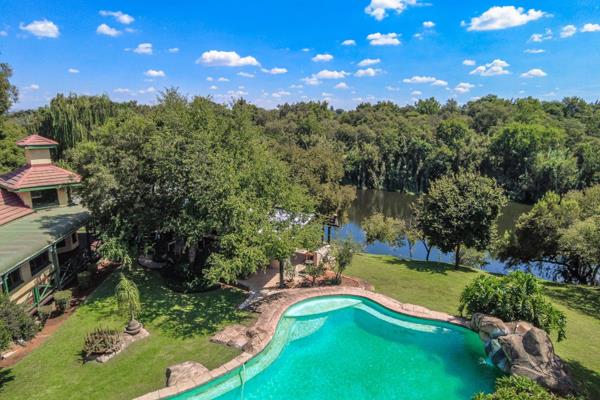 A Rare Gem with Stunning River Frontage! Exclusive Lifestyle living at its best!

DUAL MANDATE

For the discerning Buyer! Located 5 minutes out of Brits on the Crocodile River, you will find this exquisite 1.56ha smallholding waiting for you to enjoy the perfect Lifestyle ...