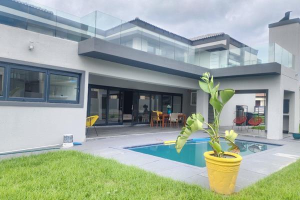 Opulence Awaits You In Blue Valley Golf Estate:


Nestled within the serene confines of the esteemed Blue Valley Golf Estate, this ...