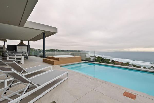 Scenic sea views from this modern four-bedroom home in Tahari Coastal Estate. On entrance is a spacious living, dining area, built in ...