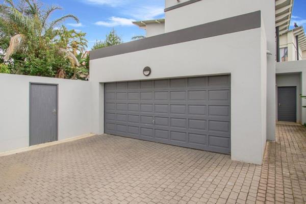 The spacious living area welcomes you with an elegant fireplace, flowing seamlessly into an open-plan dining and kitchen space. Step ...