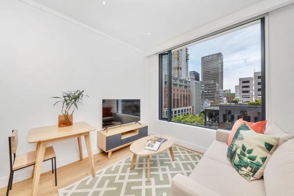 STUDIO - Relax in an open-plan living area with seating, smart TV and equipped kitchenette complimented by ceiling height windows for ...