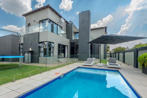 This exclusively mandated,  designer mansion is a combination of stylish quality and ...