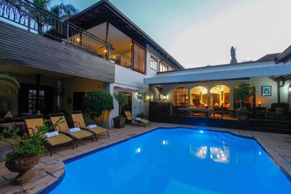 This luxurious property, currently operating as a successful guesthouse, boasts nine ...