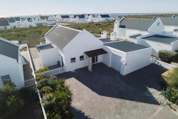 EXCLUSIVE SOLE MANDATE
Nestled in Dwarskersbos, this delightful 3-bedroom home offers ...