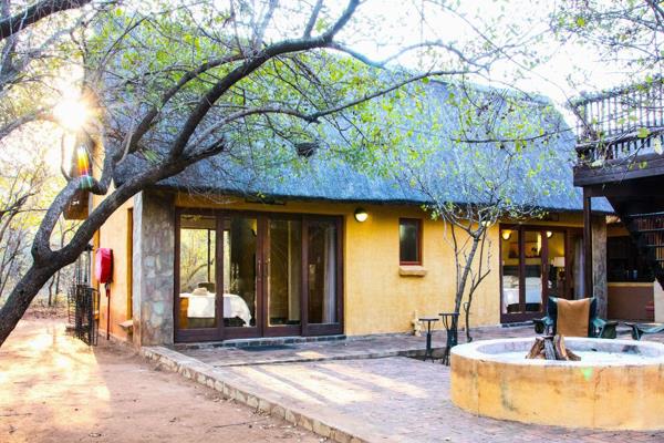 Nestled within the prestigious Hoedspruit Wildlife Estate, awaits an exceptional investment opportunity - an 10-sleeper lodge offering ...