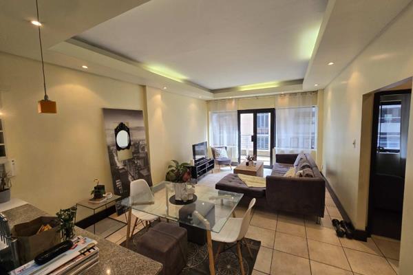 Introducing a charming two-bedroom, one-bathroom apartment in a Ferreirasdorp.. This ...