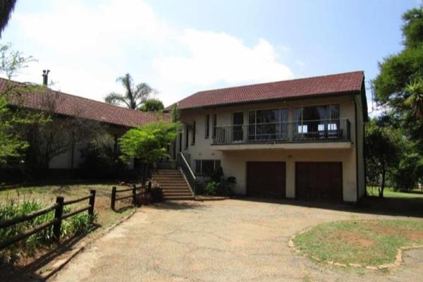 Spacious 9400sqm property featuring 4 peaceful bedrooms, 2 clean bathrooms, comfortable living areas with a fireplace, large farm style ...