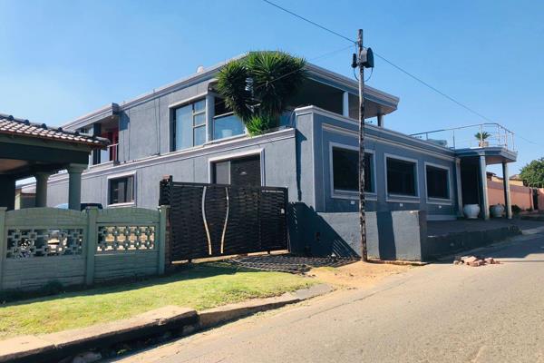 Discover modern living in this stunning double-storey house in Orlando East, Soweto ...