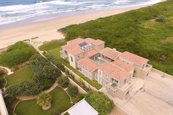 JOINT MANDATE 

A Myoli Beach home framed by the white sand beach, lush evergreen bushes and an awe-inspiring ocean frontage. If you ...