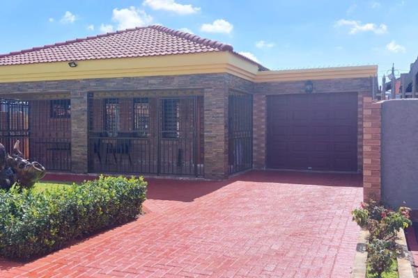 This immaculate property in the heart of Lenasia presents a modern house with 3 bedrooms featuring built-in cupboards, complemented by ...