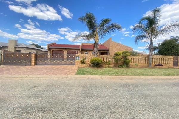 This beautiful facebrick home boasts a modern design with aluminum window frames throughout. Upon entering, you are greeted by an ...